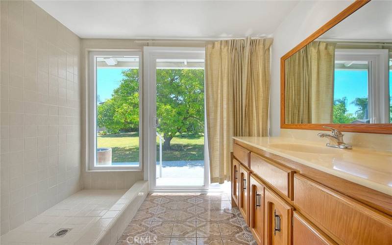 Sliding door to the back yard, from the bathroom