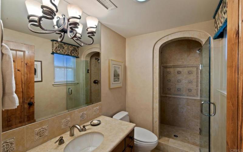 Upstairs bathroom with shower area.