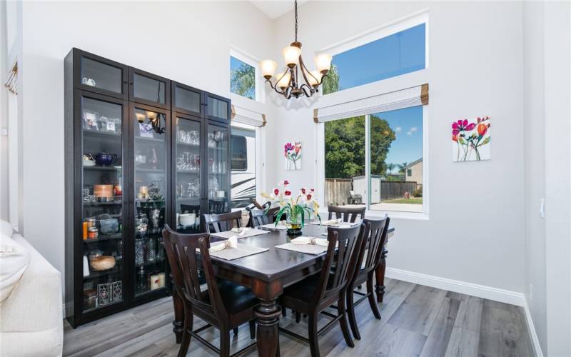 Formal dining room with open and bright window
