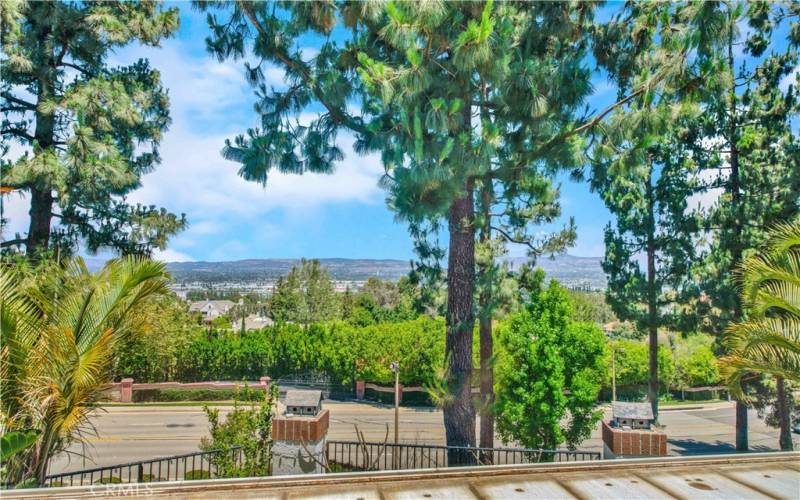 offers stunning hill and city lights view from all main rooms the highly desirable neighborhood of Canyon Terrace