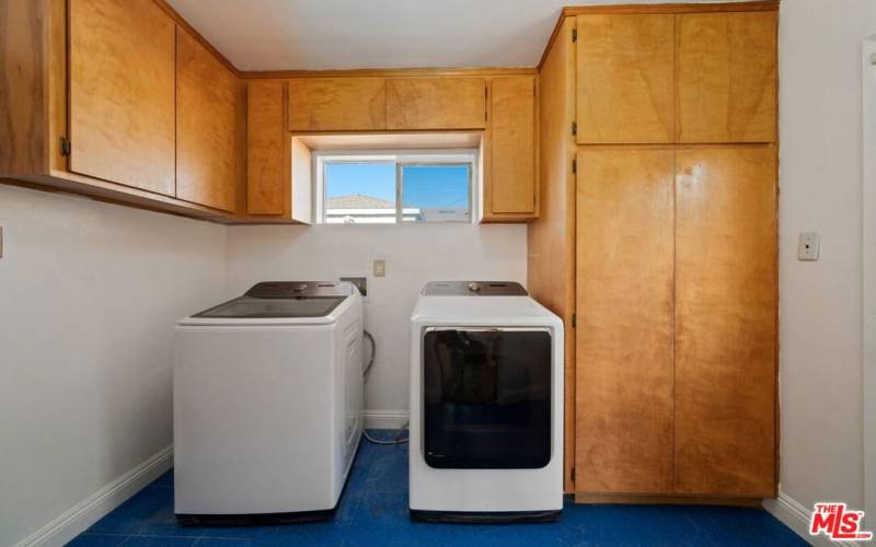 Laundry room with access to the backyard