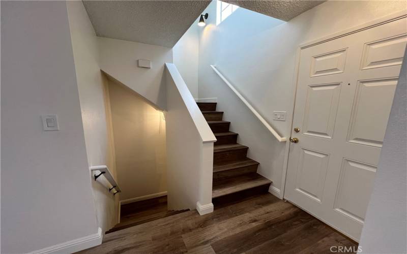 Stairs to third floor and to garage