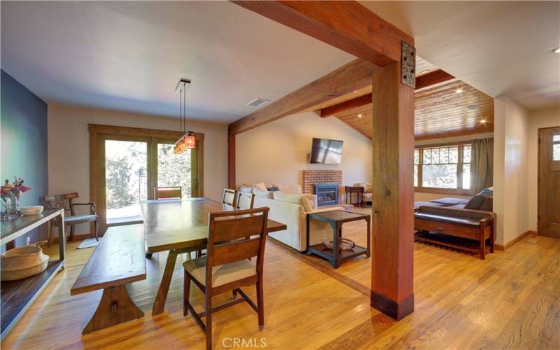 Dining area, living room to the right, sliding doors access the backyard