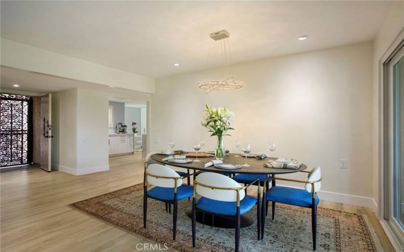 Beautiful dining area facing entrance to kitchen