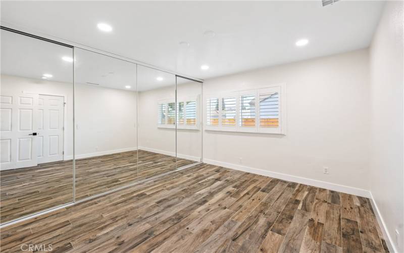 2nd Bedroom with mirrored wardrobe and closet system