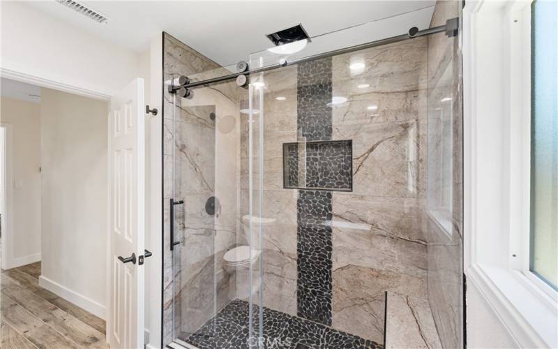 Designer finishes and tile work in walk-in shower