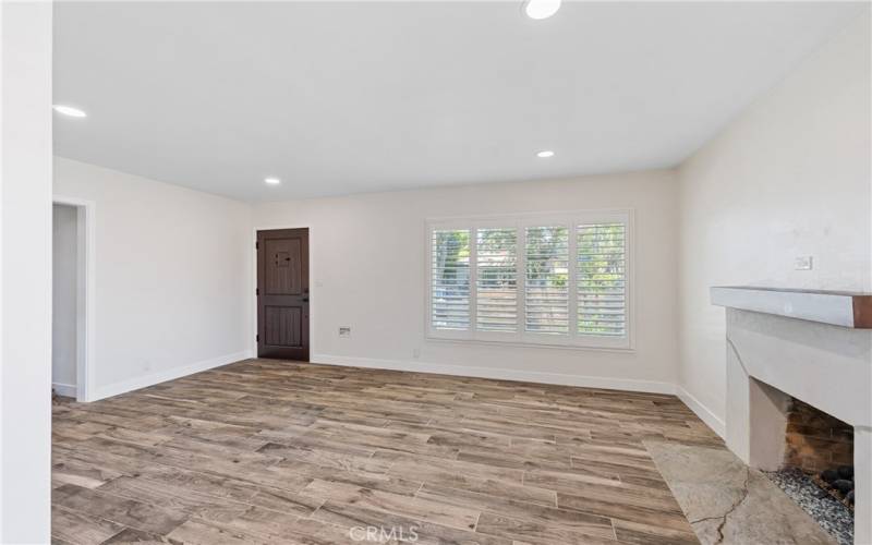 Large Living area with Fireplace overlooking frontyard