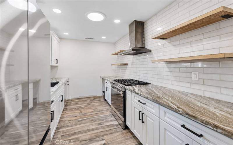 Contempory Kitchen with new Stainless Appliances and high-end finishes