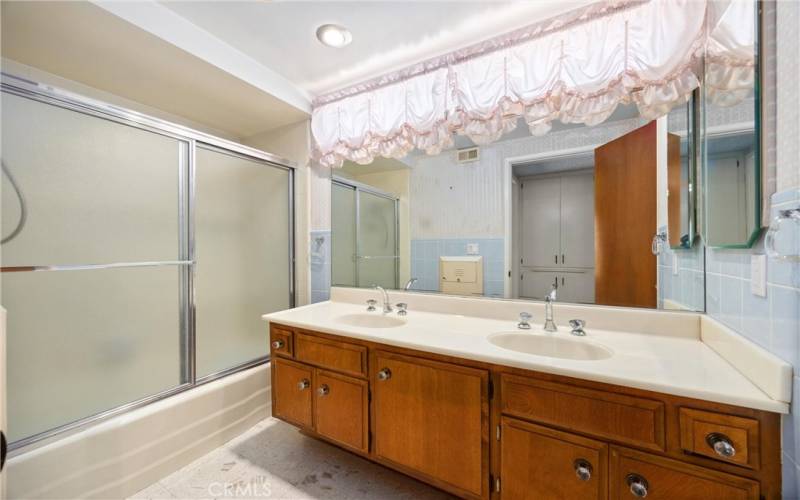 Upstairs Bathroom with double sinks/shower and bathtub, separate toilet