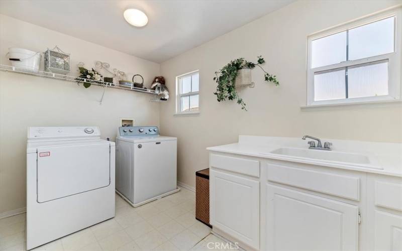 Oversized Laundry Room with Sink