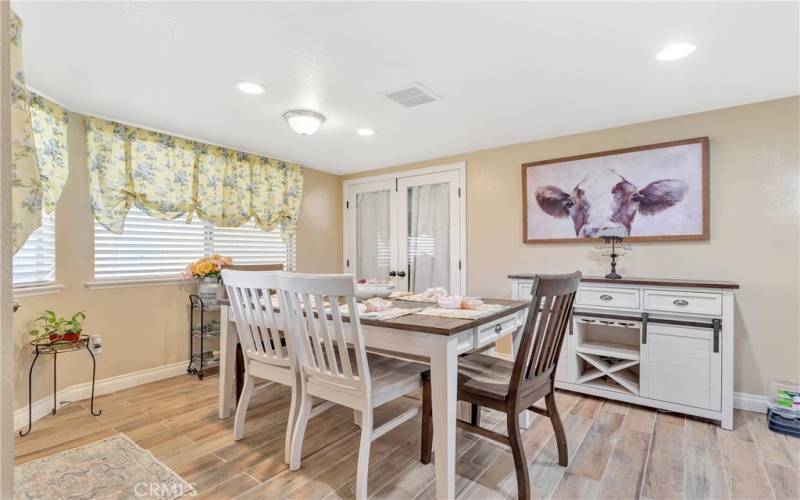 Wonderful Upgraded wood grain tile throughout the home.