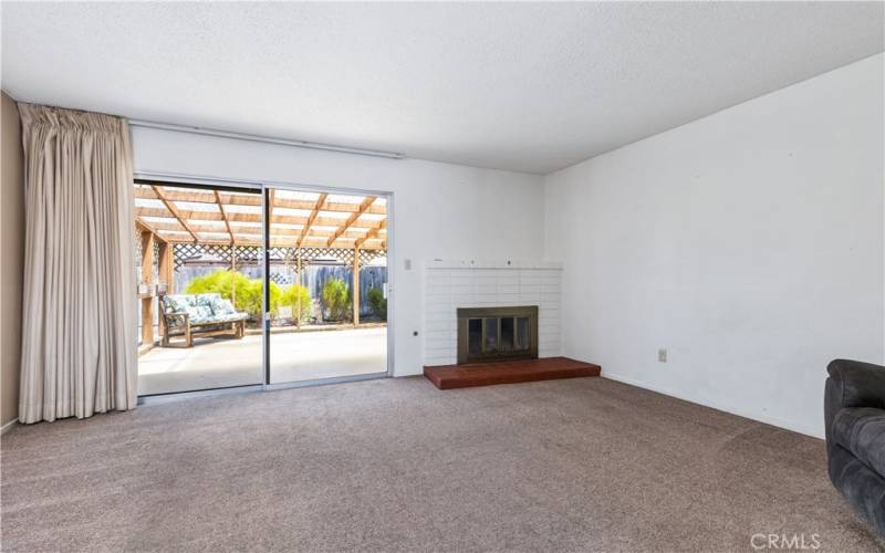 Living room that leads to the covered patio.