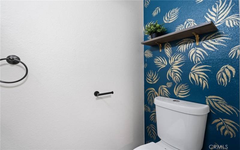 New finishes and tropical theme in downstairs bathroom.