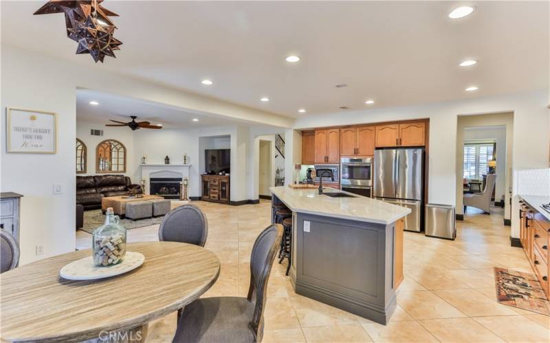 Great angle showing kitchen and family room