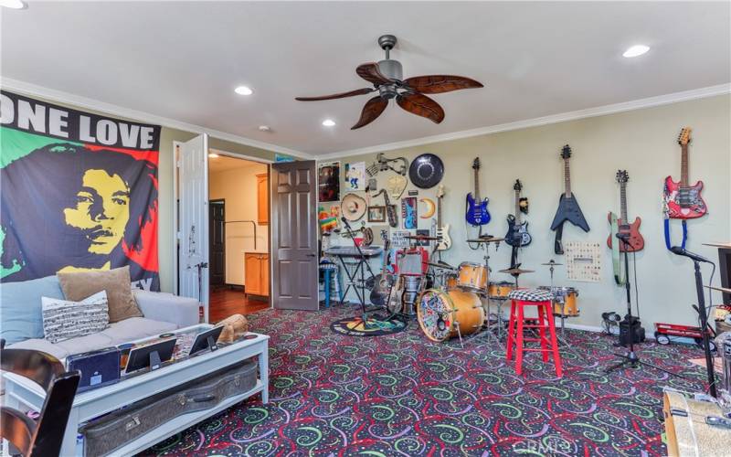 Large Upstairs bonus room/loft use as a music room, new carpet to help with sound. Tinted windows.