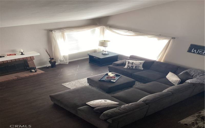  This photo is looking down onto the formal living room from the stairs