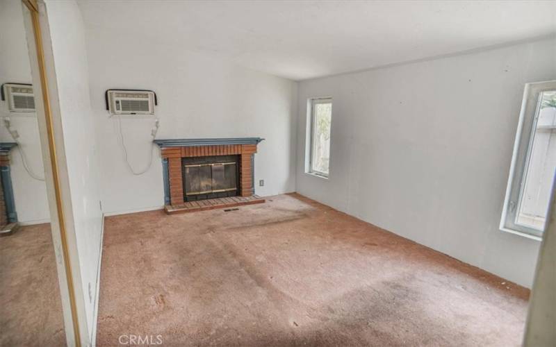 PRIMARY BEDROOM WITH FIREPLACE