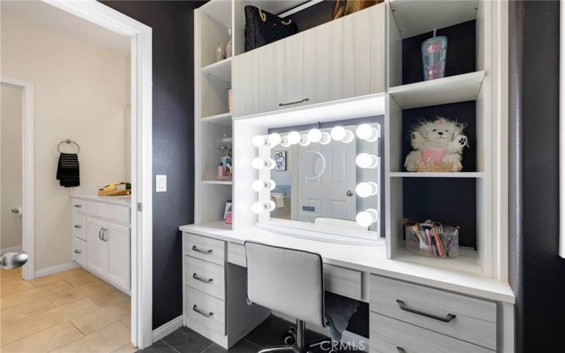Master closet with a makeup vanity *the mirror does not convey*