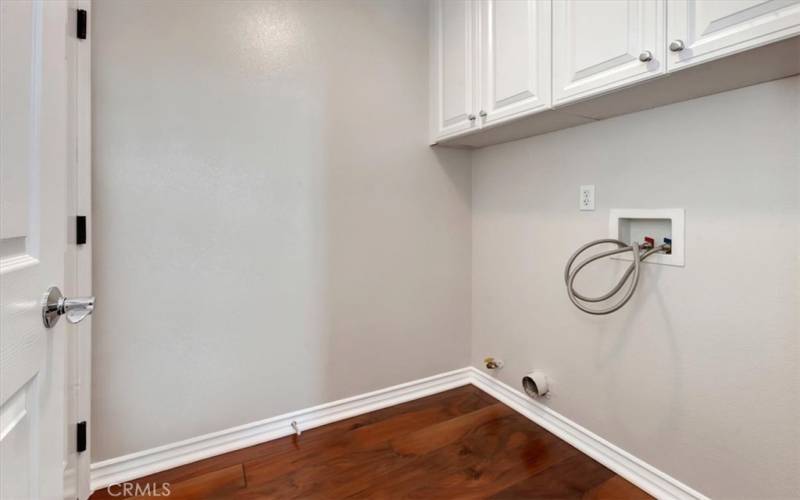 Laundry room located off garage.