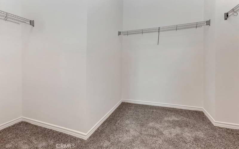 Walk in closet for primary suite upstairs.