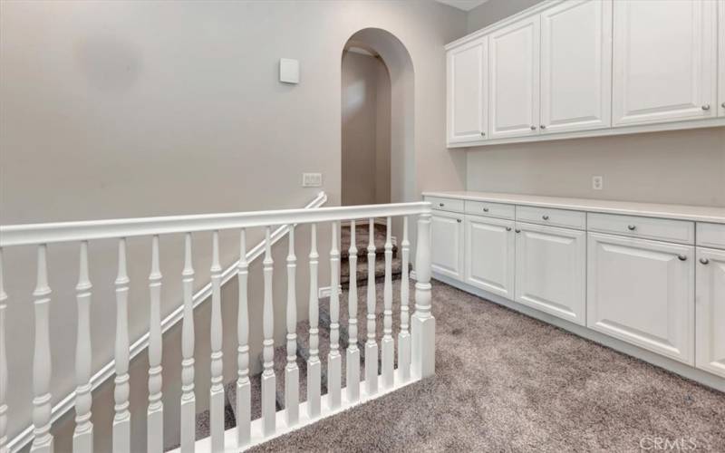 Upstairs landing with linen closet.