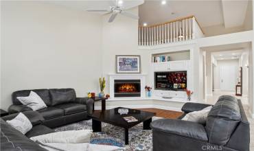 Spacious family room with Cozy Fireplace.