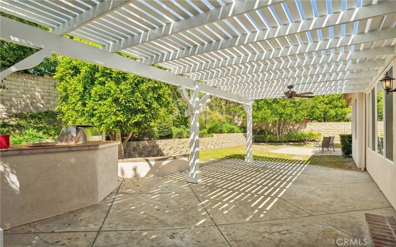 Backyard with Built-in BBQ and Patio Cover.