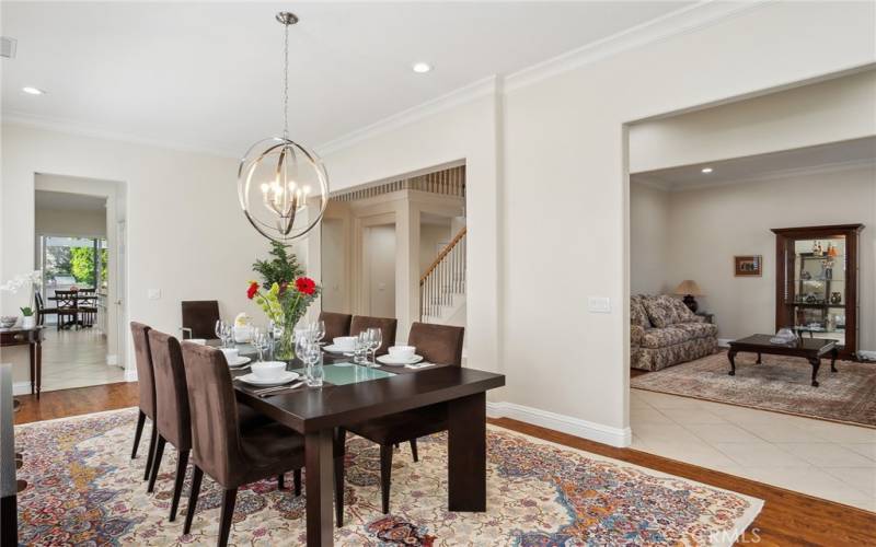 The dining room is close to the kitchen, family, and living room.