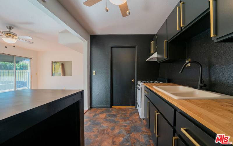 Kitchen facing powder room