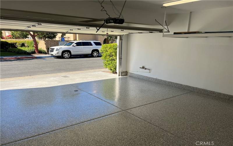 Newly redone garage with epoxy floor coating.