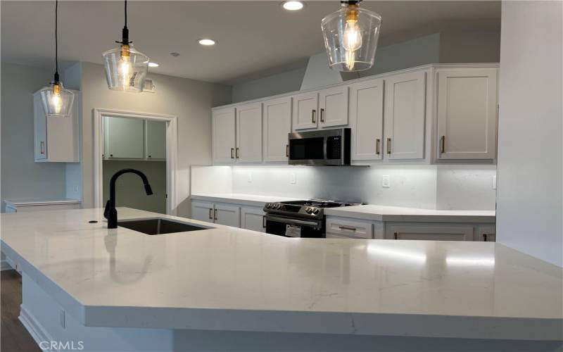 Photo of kitchen looking towards the laundry room.