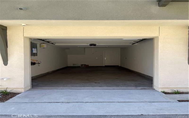 Attached oversized 1-car garage with direct access.