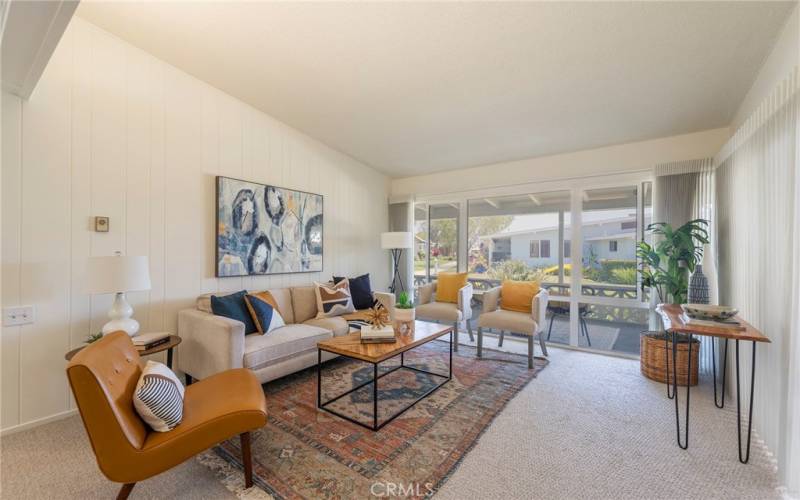 Freshly painted and carpeted living room.