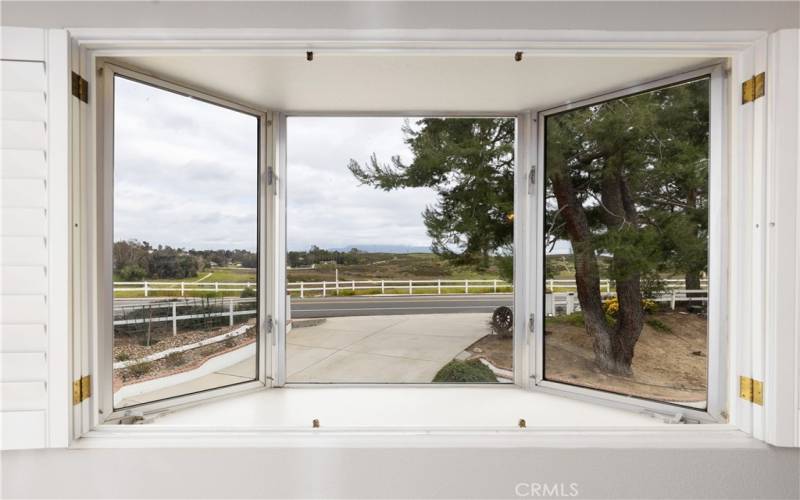 Gorgeous views surrounding you in your Primary Room upstairs (Two master bedrooms in this home)