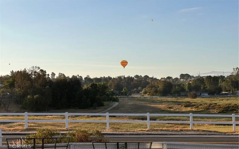 On this primary deck, balloons and views from all sides while you enjoy your coffee.