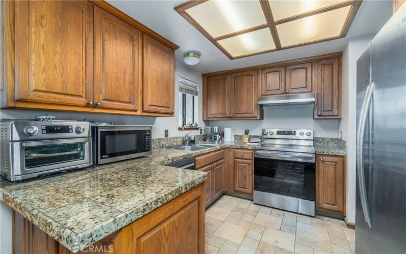 Kitchen with Stainless Steel​​‌​​​​‌​​‌‌​​‌​​​‌‌​​​‌​​‌‌​​‌‌​​‌‌​​​​ Appliances