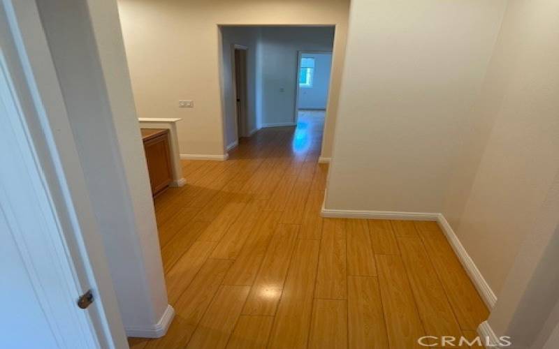 Hallway view into 3 Guest Bedrooms with Mirrored Wardrobes