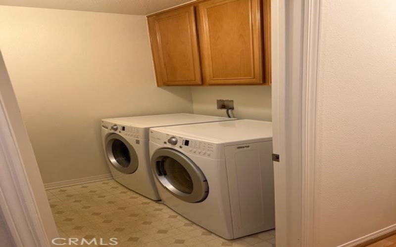 Separate Laundry Room with Newer Washer and Dryer