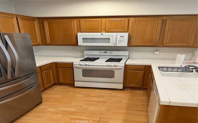 The Kitchen is a welcome invitation to the surrounding open floor plan