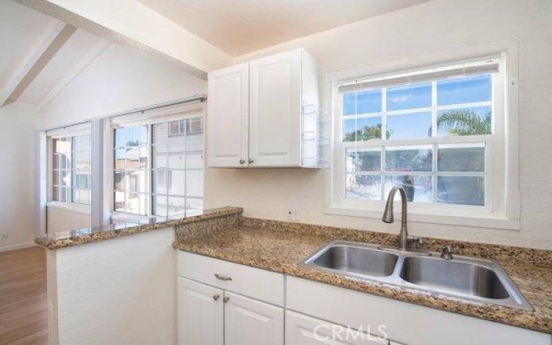 Kitchen with Window to Peek-a-Boo Bay View