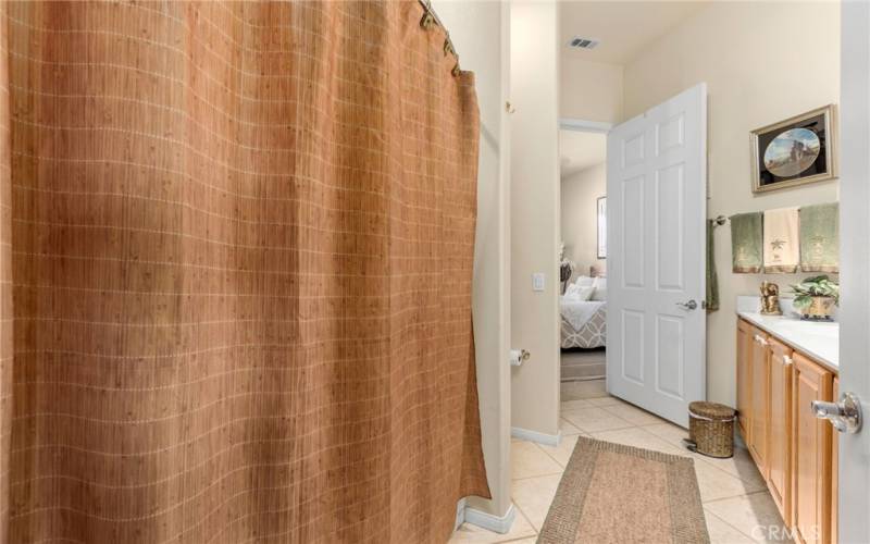 Guest bathroom with guest bedroom access door