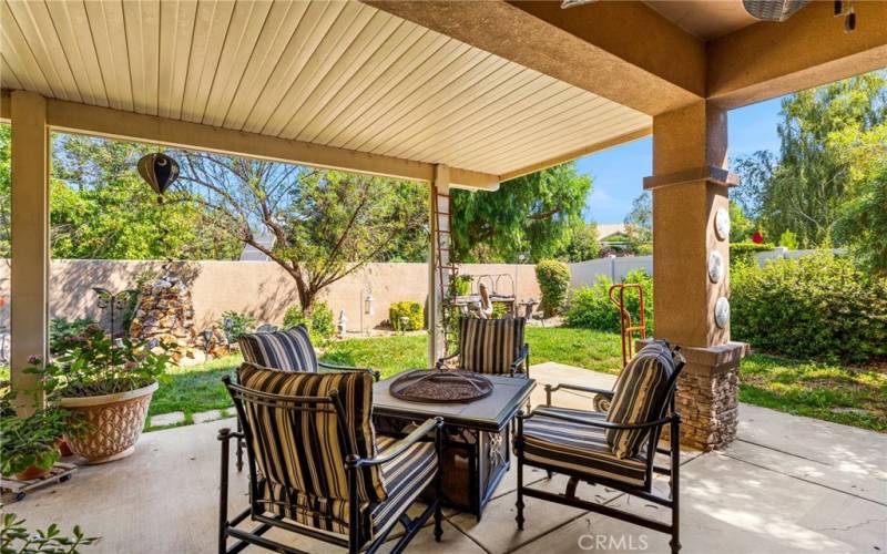 Roof covered patio with lots of shade.