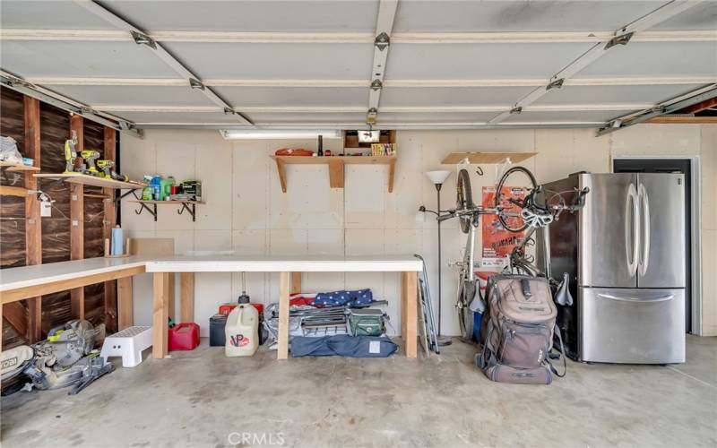 Storage space in garage, behind this wall is the music studio.