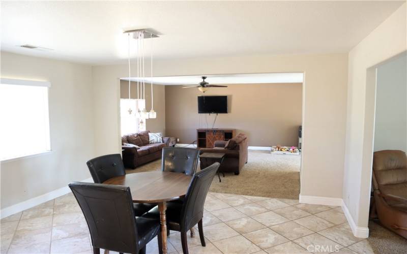 Dining room leading to the right, living room