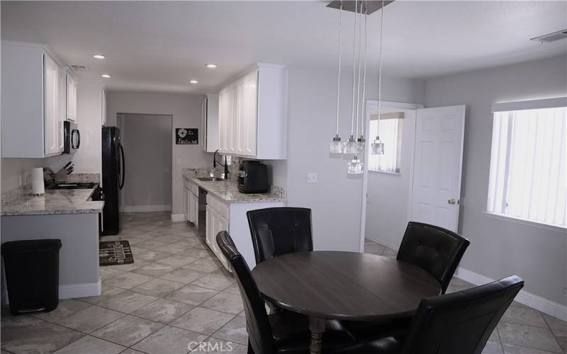 Dining room and kitchen, with laundry in seperate room