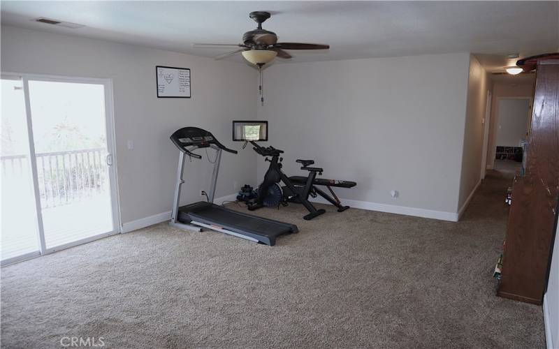 Large living room and hallway leading to bedrooms