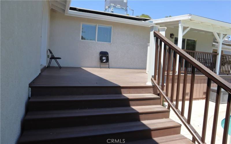 Staircase off primary bedroom deck