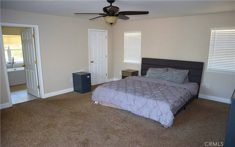 Primary bedroom with private deck and access