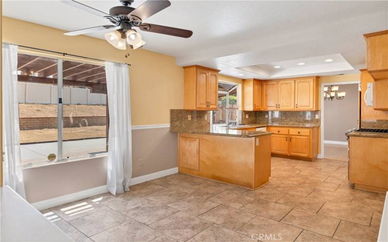 Looking from Breakfast Nook outdoors and towards Kitchen.