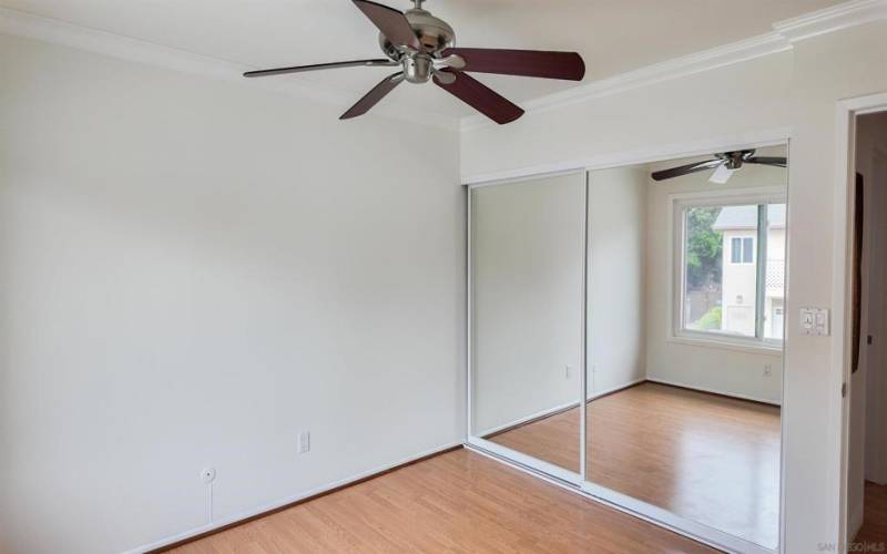 Note mirrored closet doors.  Crown molding.